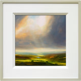 Framed artwork of a Harry Brioche landscape with a colourful sky and rolling hills.