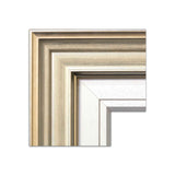 A close-up view of the frame this painting comes in. A simple, elegant facing with warm tones, around a white, wooden inner frame.
