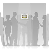 Silhouettes of people gathered around a Harry Brioche painting on a wall.