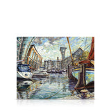 A signed, limited edition print of "St.Katharine Docks" by artist Allan Stephens, on a 30 inch box canvas.