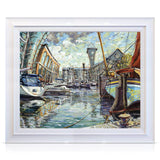 A signed, 40 inch limited edition print of "St.Katharine Docks" from artist Allan Stephens, in a white frame.