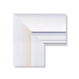 One of our hand crafted picture frames: a glossy white concave exterior with a matte white natural woodgrain inner slip.