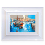 A signed, 20 inch limited edition print of "Barges, St.Katharine Docks" from mixed media artist Ed Robinson, in a white frame.