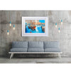 Artist Ed Robinson’s 30 inch limited edition print of "Barges, St.Katharine Docks" displayed in a modern warehouse conversion.
