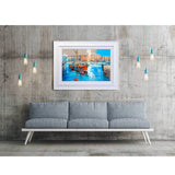 Artist Ed Robinson’s 30 inch limited edition print of "Barges, St.Katharine Docks" displayed in a modern warehouse conversion.