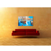 Artist Ed Robinson’s 40 inch limited edition print of "Barges, St.Katharine Docks" displayed in a boutique waiting area.