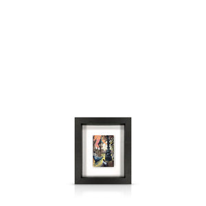 A framed artwork featuring a River Thames cruise scene, mounted on a black frame.
