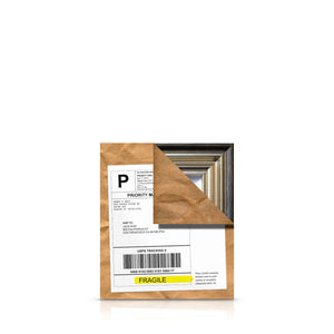 Having been purchased by a collector, we see this original framed painting by artist Andrew Grant Kurtis packaged in brown paper ready to be shipped.