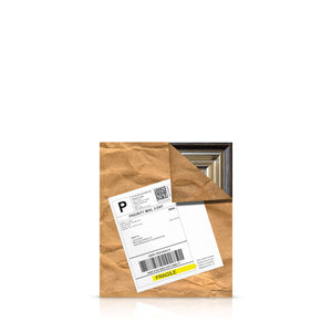 Purchased by a customer who fell in love with it, this Andrew Grant Kurtis painting is wrapped in brown paper with an attached shipping label, ready for delivery.