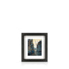 A framed 13 inch artwork featuring the warehouses of Butlers Wharf leading to the River Thames, float-mounted on a black frame.
