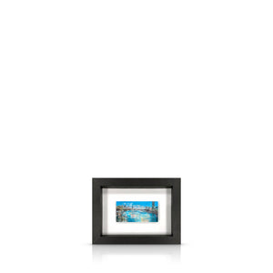 Artwork depicting a London cityscape view from Waterloo Bridge, float mounted in a black frame.