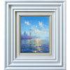 A closer view of Andrew's painting; it's simple, bevelled frame leading your eye towards bright blue skies and a summer's day overlooking the lagoon.