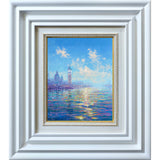 A closer view of Andrew's painting; it's simple, bevelled frame leading your eye towards bright blue skies and a summer's day overlooking the lagoon.