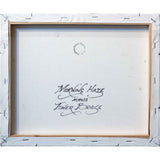 The reverse side of Andrew's painting. Andrew has hand-written the painting title directly  onto the canvas, and stamped his work with his name and qualifications.