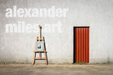 Andrew's painting displayed framed on an easel, outdoors, behind our framing workshop.