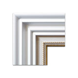 A closer look at the frame. A simple, white bevelled outer frame is accentuated by the ornate detailing of a much smaller, decorative inner frame.